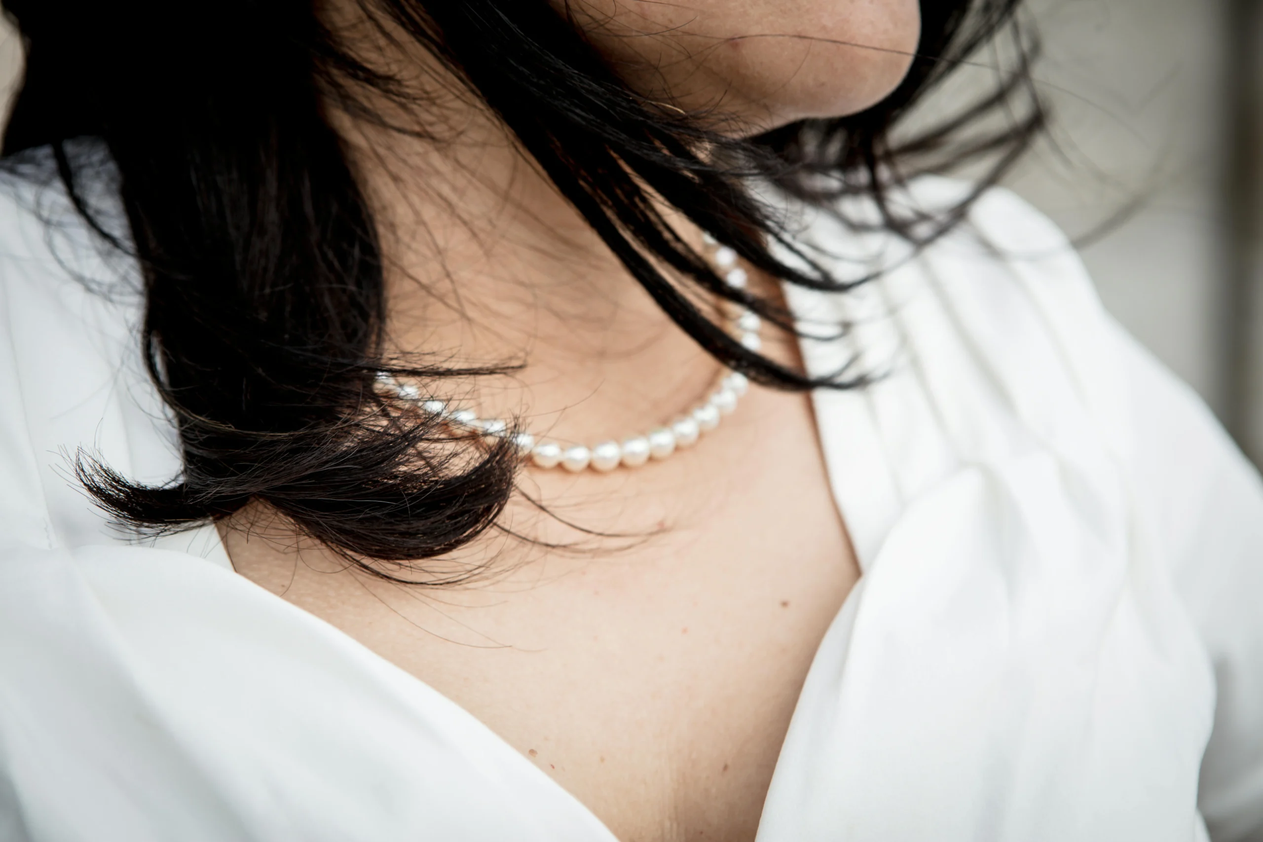 Timeless Elegance: Styling a Pearl Necklace with Single Pearl Earrings